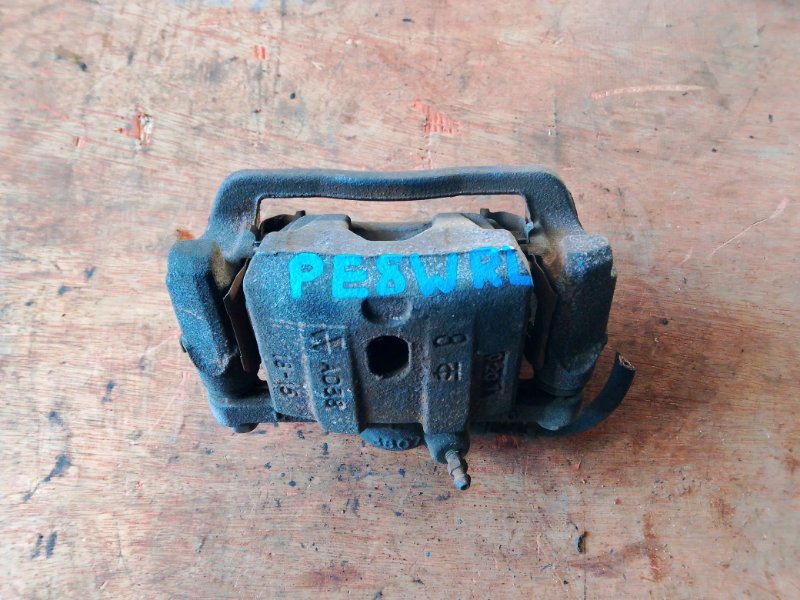 Суппорт Mitsubishi Delica PE8W 4M40 задний левый (б/у)