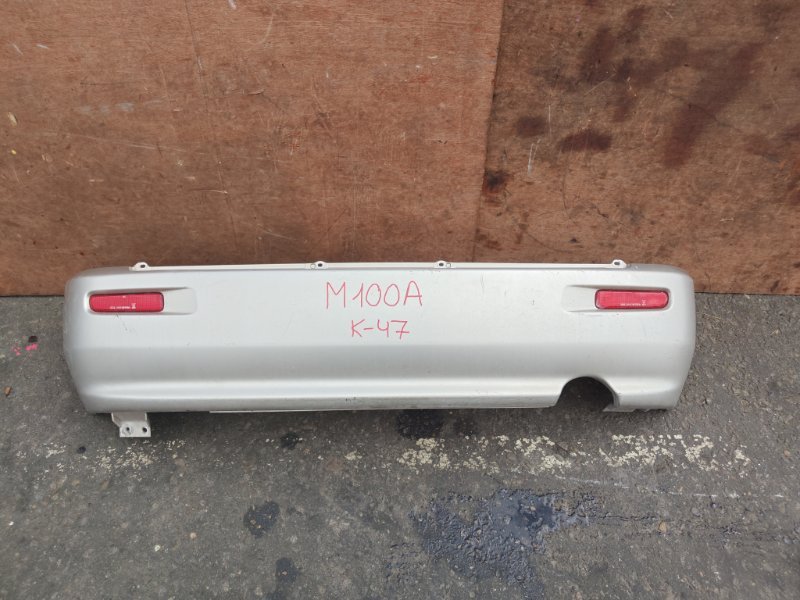 Бампер Toyota Duet M100A EJVE задний (б/у)