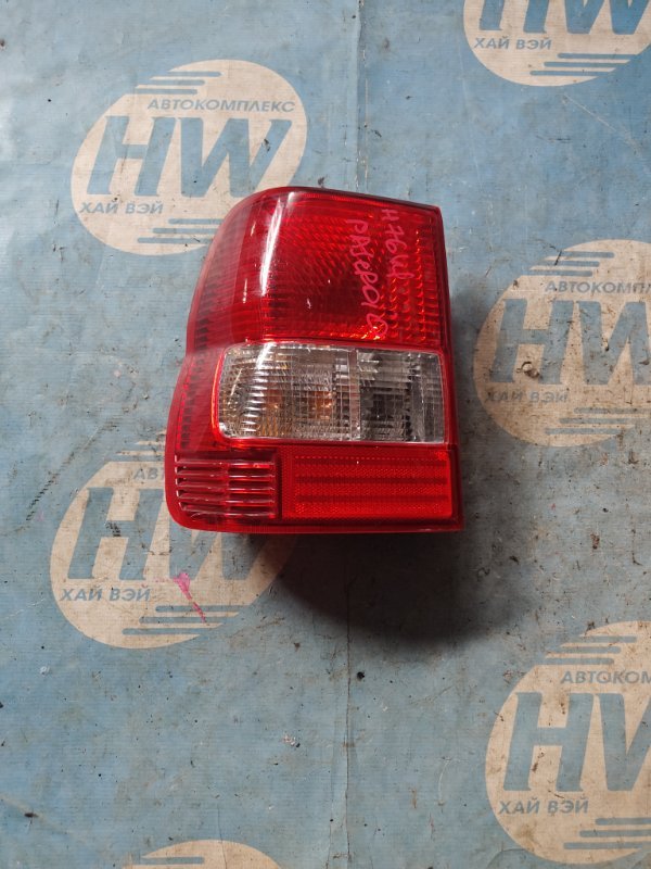 Стоп Mitsubishi Pajero Io H76W 4G93 левый (б/у)