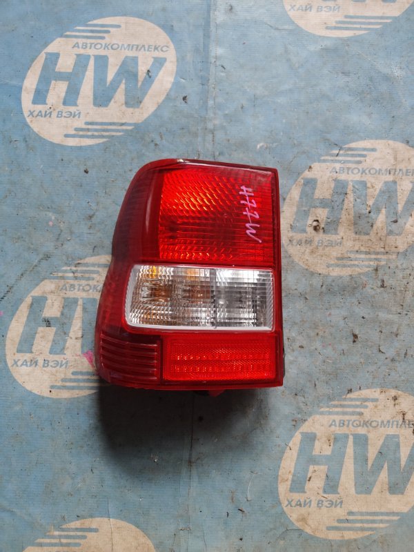 Стоп Mitsubishi Pajero IO H77W 4G94 левый (б/у)
