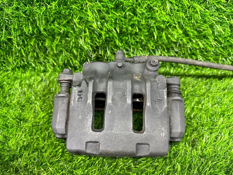 Суппорт NISSAN LIBERTY PM12 передний левый (б/у)