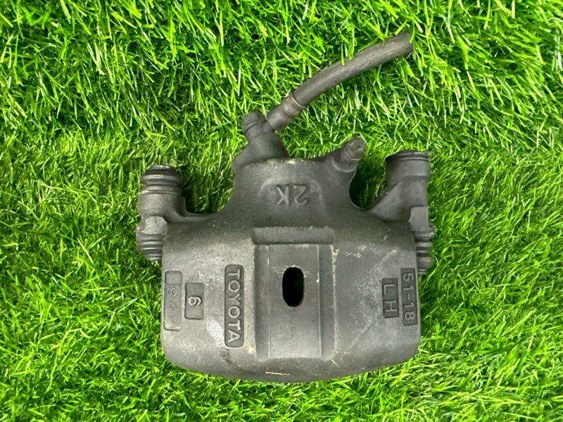 Суппорт TOYOTA STARLET EP95 передний левый (б/у)