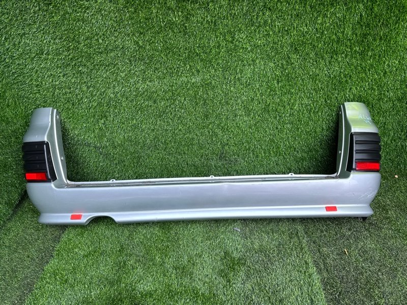 Бампер Nissan Elgrand ALWE50 задний (б/у)