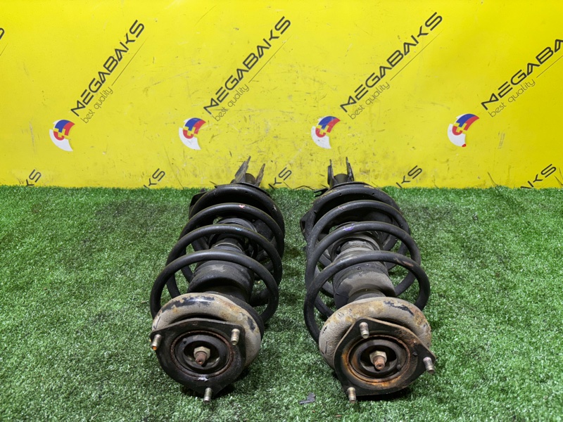 Стойка NISSAN WINGROAD WHNY11 QG18DE 2003 передняя 71.000km (б/у)