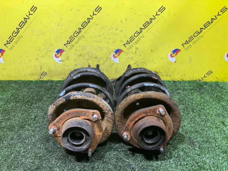 Стойка NISSAN EXPERT VW11 QG18DE 2004 передняя (б/у)