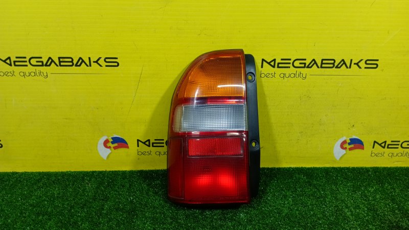 Стоп-сигнал SUZUKI ESCUDO TA52W 2001 левый 220-32077 (б/у)
