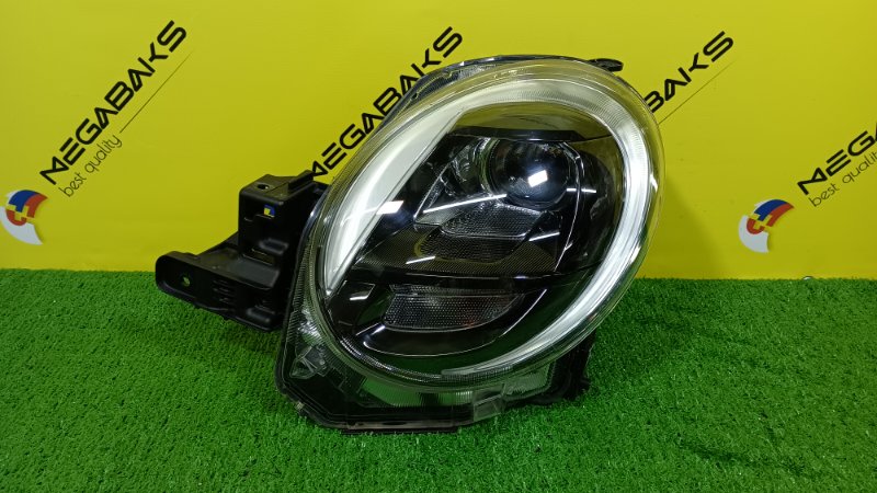 Фара DAIHATSU CAST LA250S левая 100-69020 (б/у)