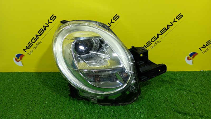 Фара DAIHATSU CAST LA250S правая 100-69020 (б/у)