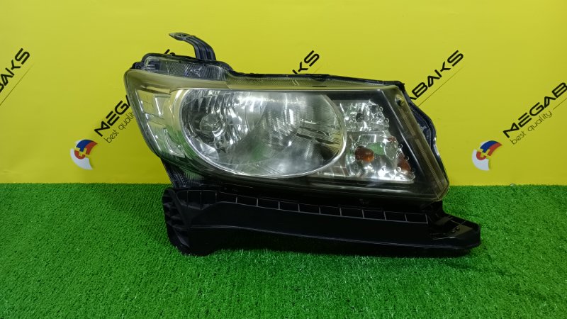 Фара HONDA FREED SPIKE GB3 правая 100-22068 (б/у)