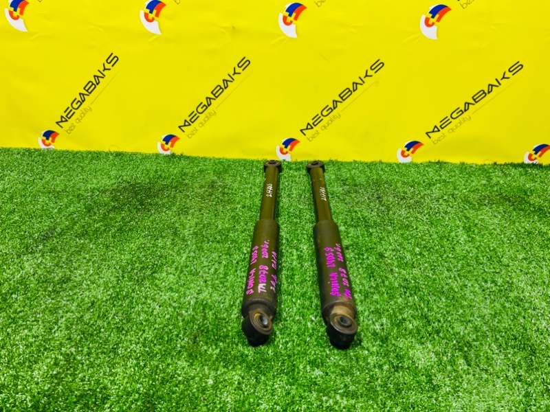 Амортизатор DAIHATSU SONICA L405S KF-DET 2006 задний (б/у)