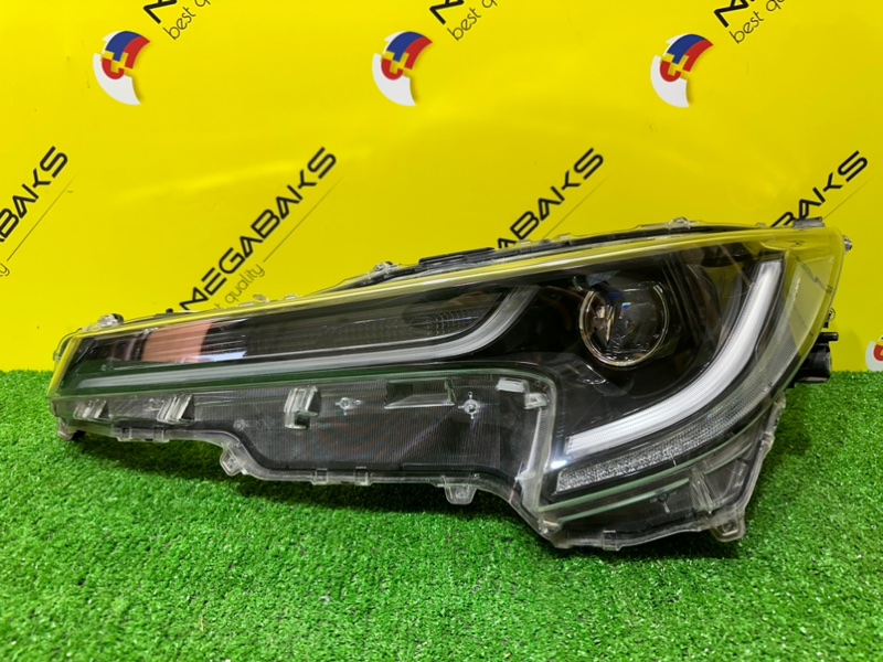 Фара TOYOTA LEVIN E210 передняя левая 02-518 (б/у)
