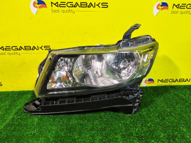 Фара HONDA FREED SPIKE GB3 L15A 2014 левая 100-22068 (б/у)