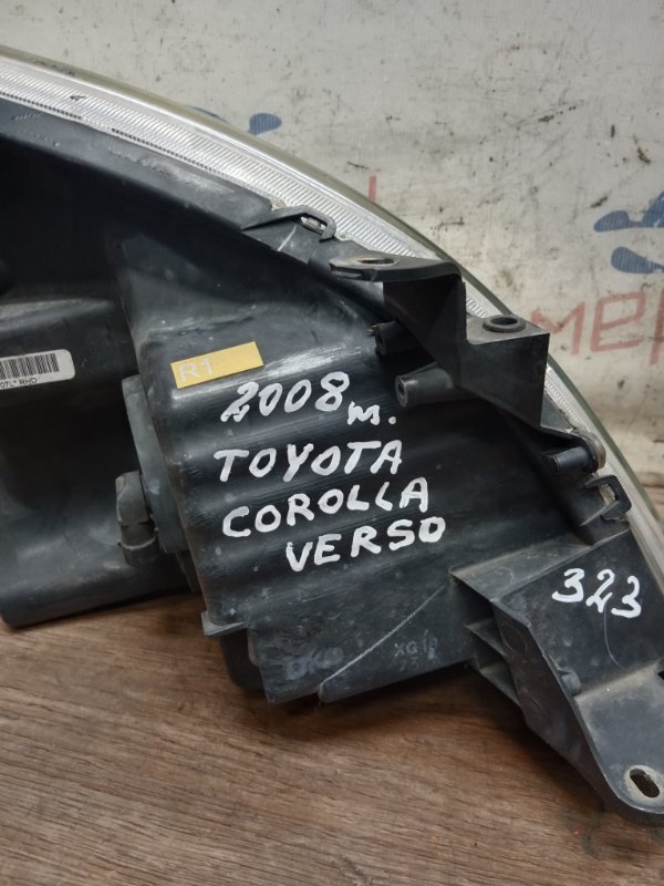 Фара левая COROLLA VERSO 2008 E121