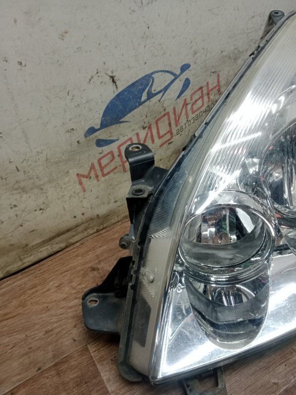 Фара левая COROLLA VERSO 2008 E121