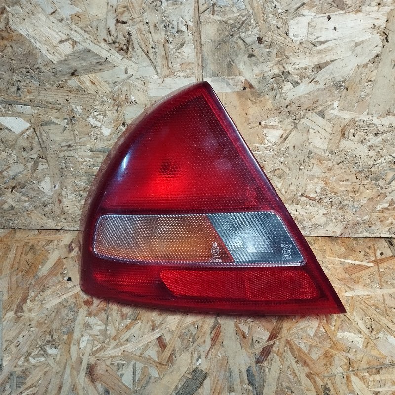 Фонарь задний наружный левый LANCER 2000 CK