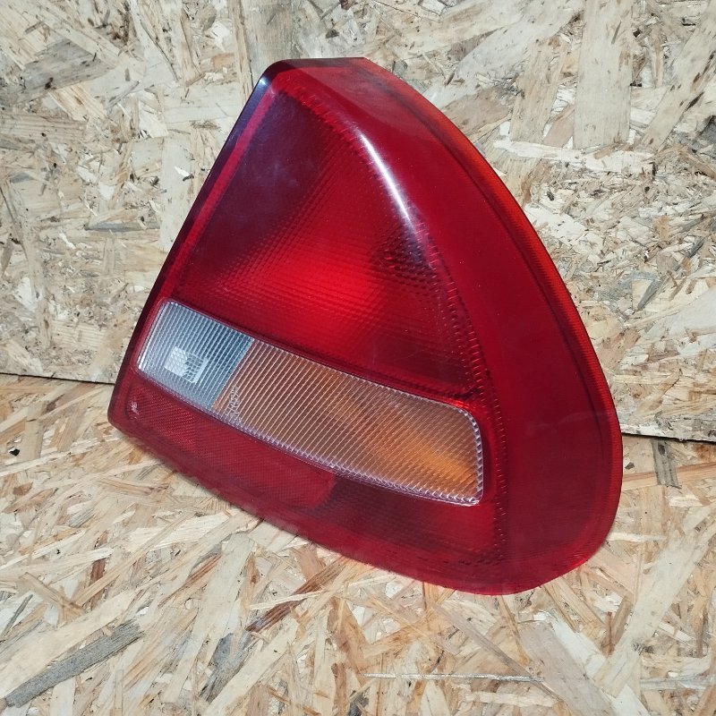 Фонарь задний наружный левый LANCER 2000 CK