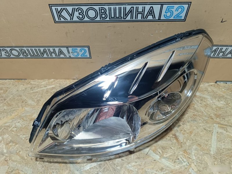 Фара левая Sandero 2009-2014 хром маска