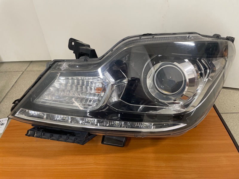 Фара передняя левая SUZUKI SOLIO 2010-2013 MA15S K12B 100-59273 контрактная