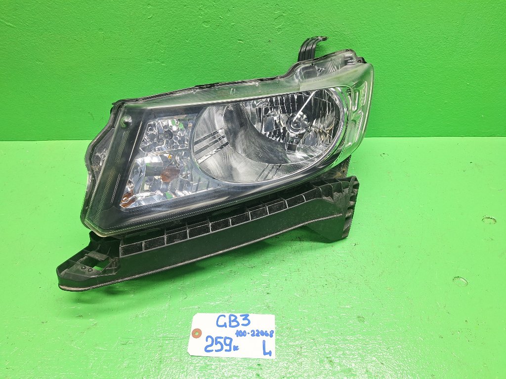 Фара HONDA FREED SPIKE GB3 левая (б/у)