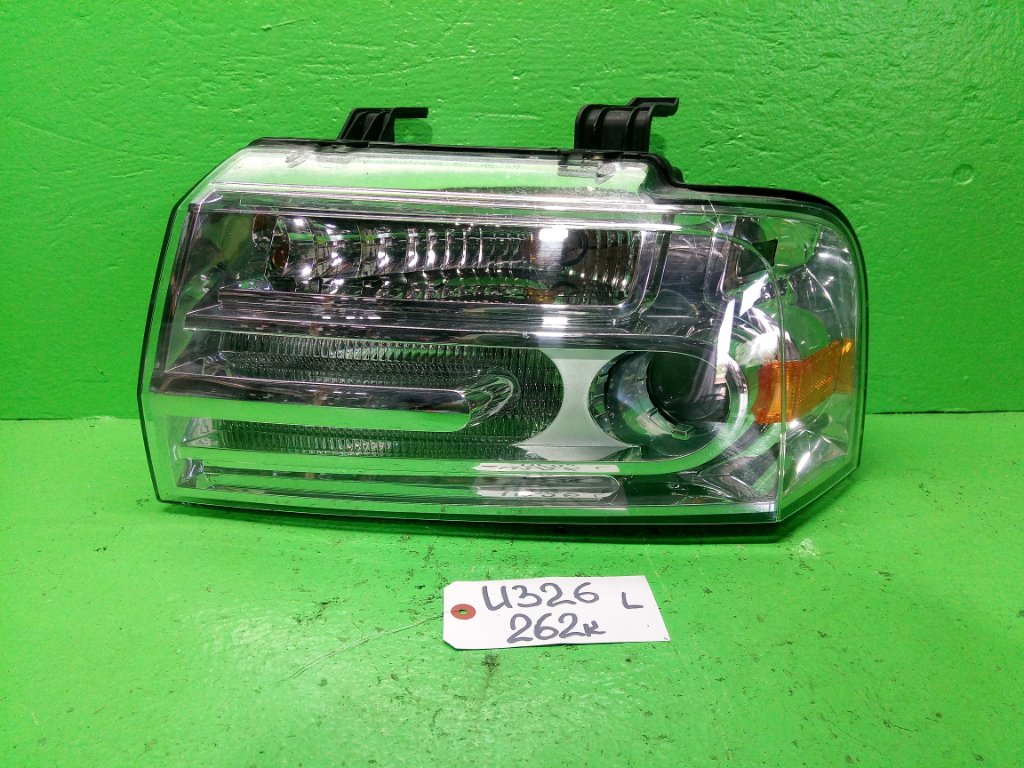 Фара LINCOLN NAVIGATOR U326 левая (б/у)
