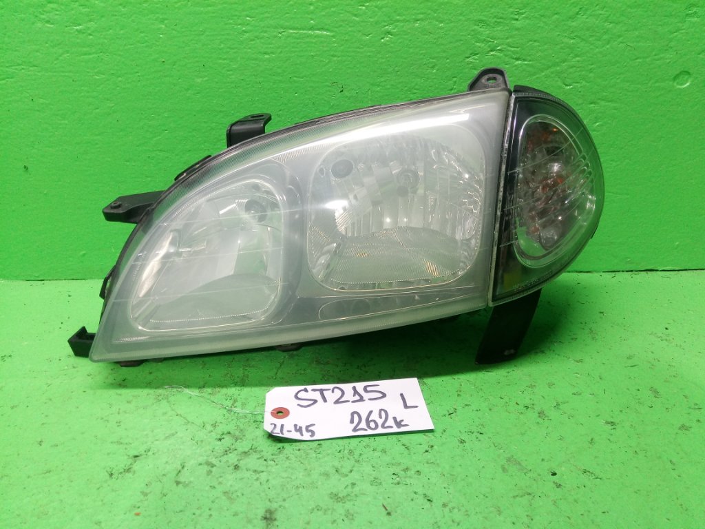 Фара TOYOTA CALDINA ST215 левая (б/у)