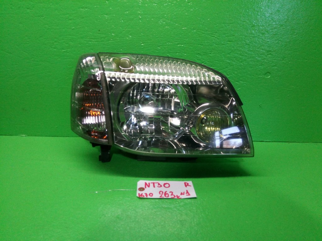 Фара NISSAN XTRAIL NT30 правая (б/у) #1