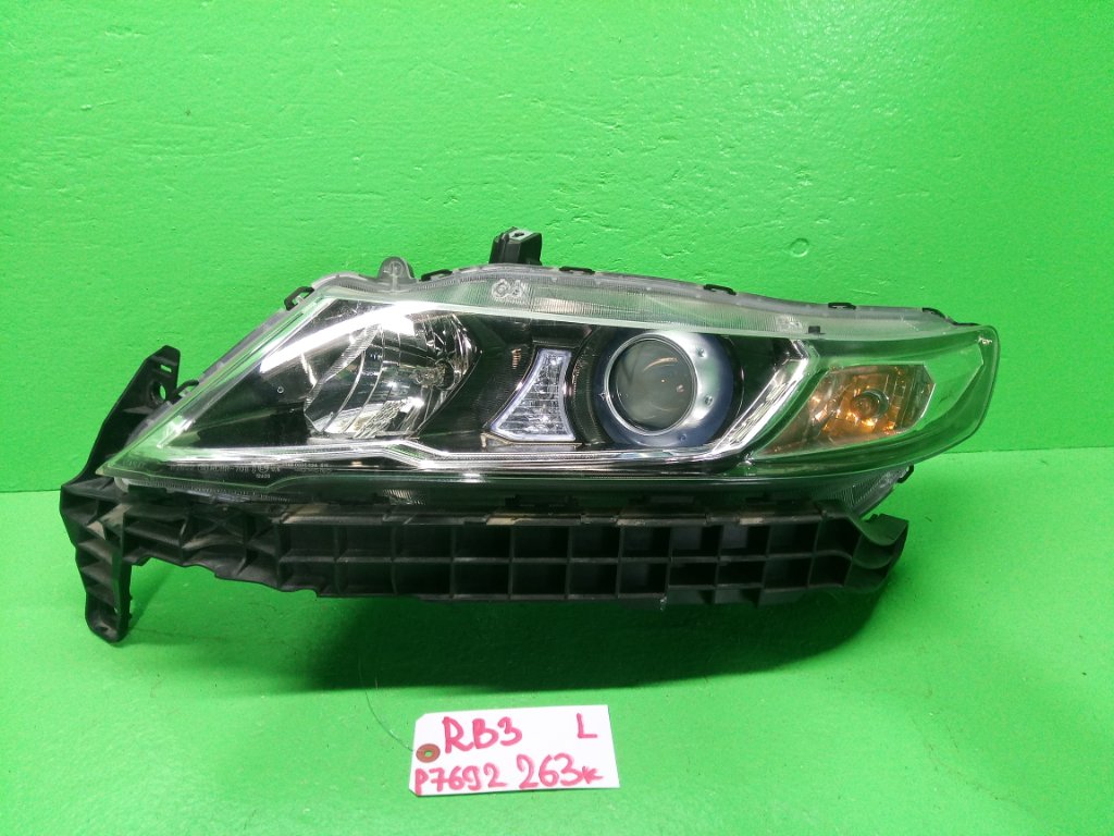 Фара HONDA ODYSSEY RB3 левая (б/у)