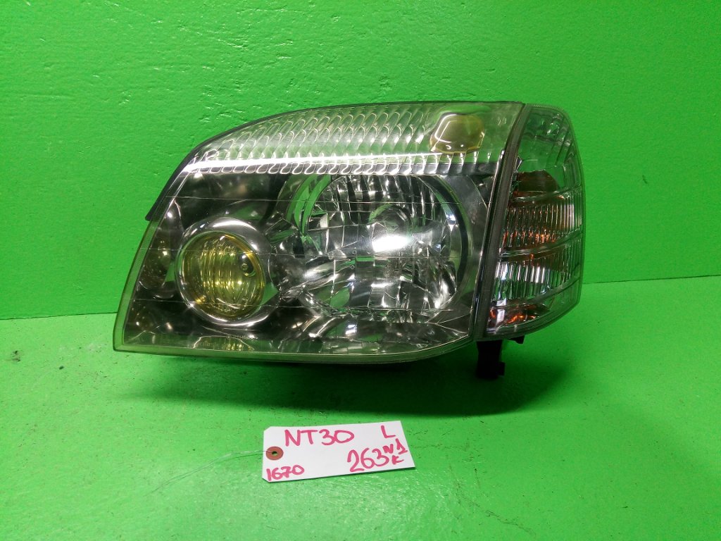 Фара NISSAN XTRAIL NT30 левая (б/у) #1