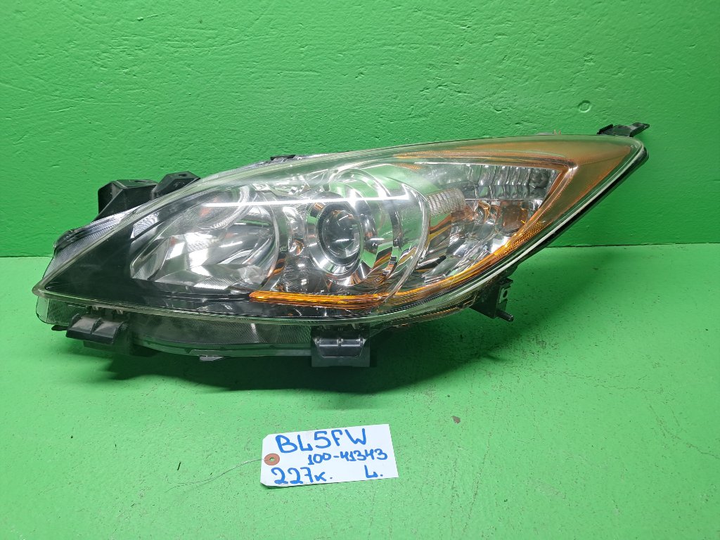 Фара MAZDA AXELA BL5FW левая (б/у)