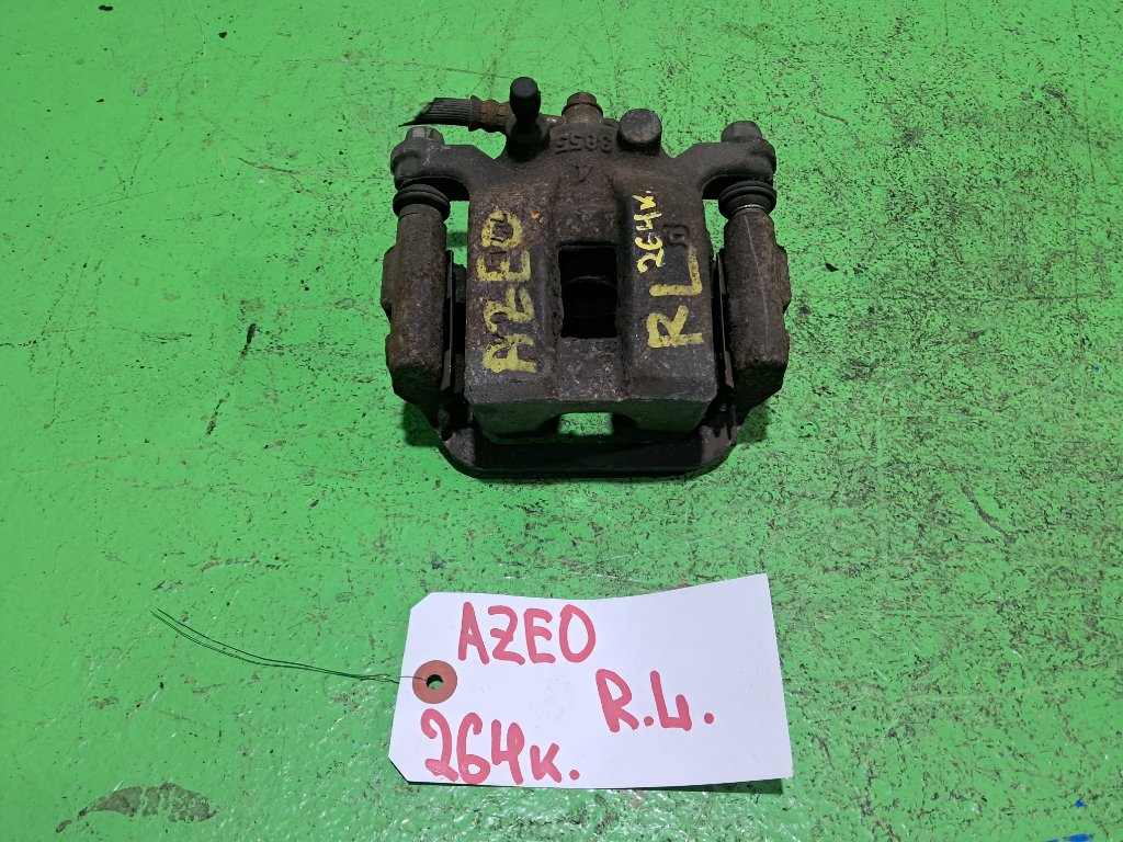 Суппорт NISSAN LEAF AZE0 задний левый (б/у)