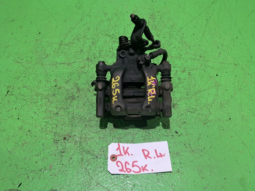 Суппорт VOLKSWAGEN GOLF 1K задний левый (б/у)