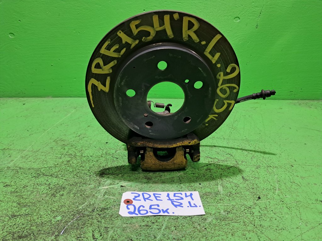 Суппорт TOYOTA COROLLA RUMION ZRE154 задний левый (б/у)