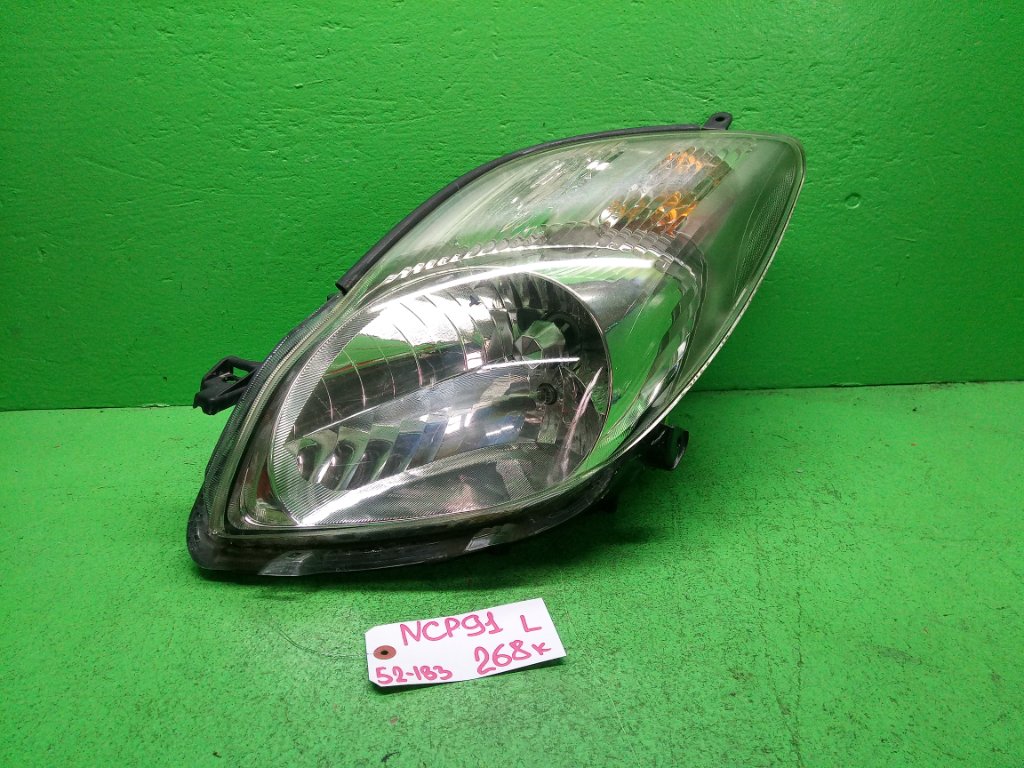Фара TOYOTA VITZ NCP91 левая (б/у)