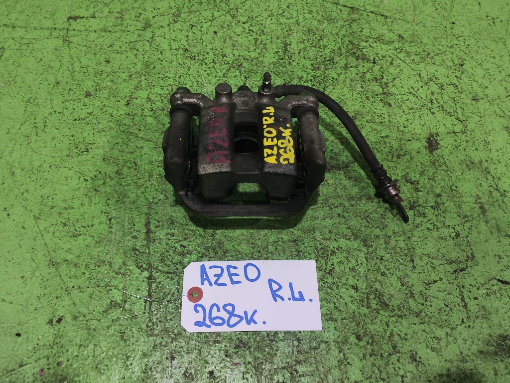 Суппорт NISSAN LEAF AZE0 задний левый (б/у)