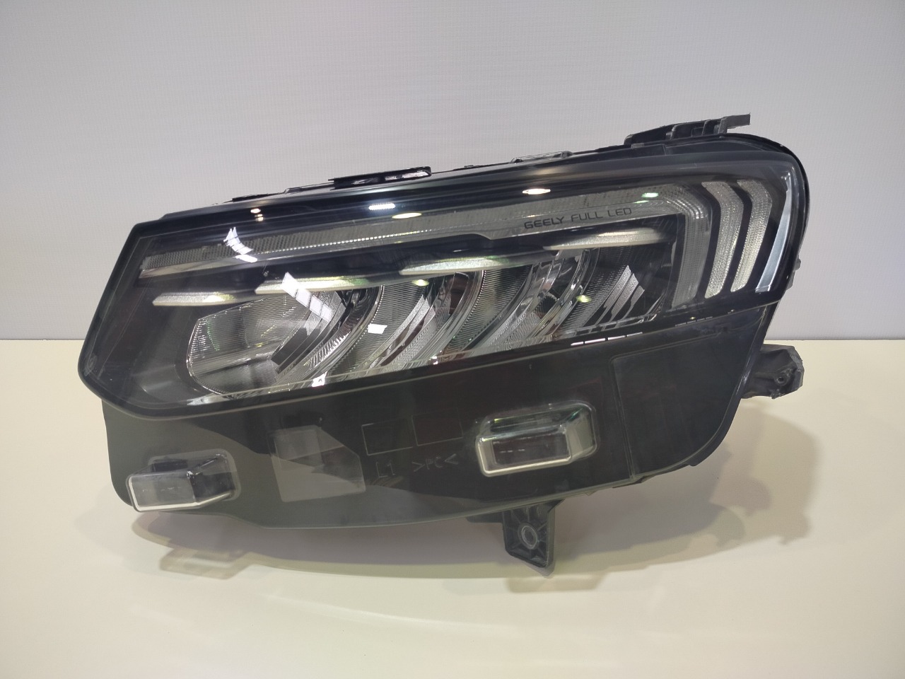 Фара левая Geely Tugella 6600006587 Б/У