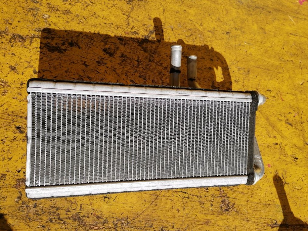 Радиатор печки ELF NJR85 4JJ1