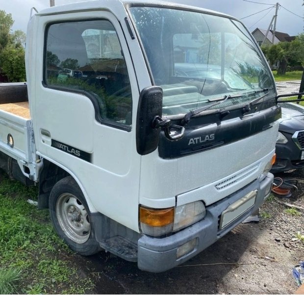 Кабина Nissan Atlas R4F23 QD32 2000 (б/у)