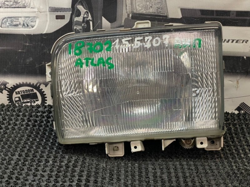 Фара Nissan Atlas P4F23 TD27 1992 левая (б/у)