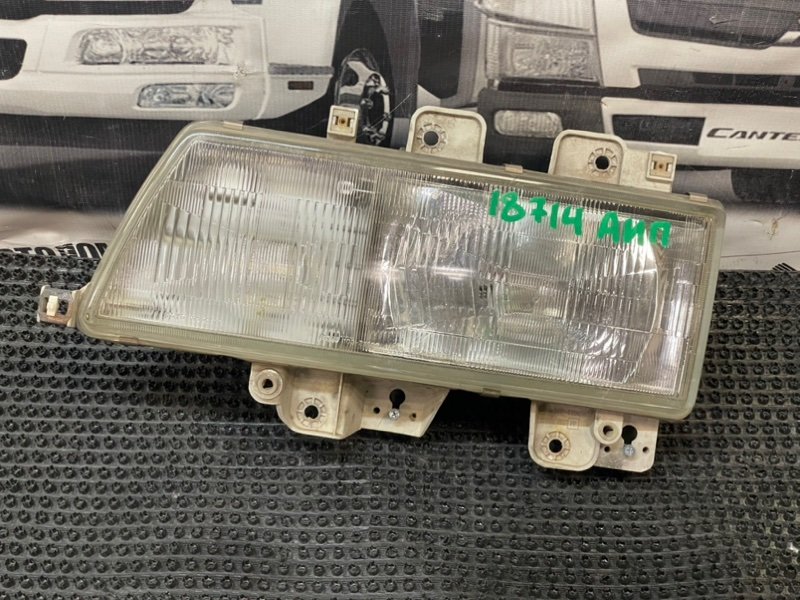 Фара Isuzu Elf NKR71G 4HG1 1993 левая (б/у)