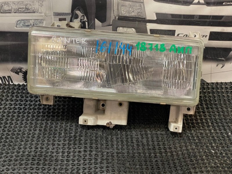 Фара Mitsubishi Canter FE538 4D35 1993 левая (б/у)