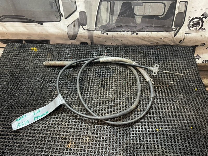 Трос ручного тормоза Isuzu Elf NKR66L 4HF1 (б/у)