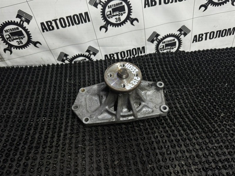 Помпа водяная Mitsubishi Canter FE517B 4D33 (б/у)