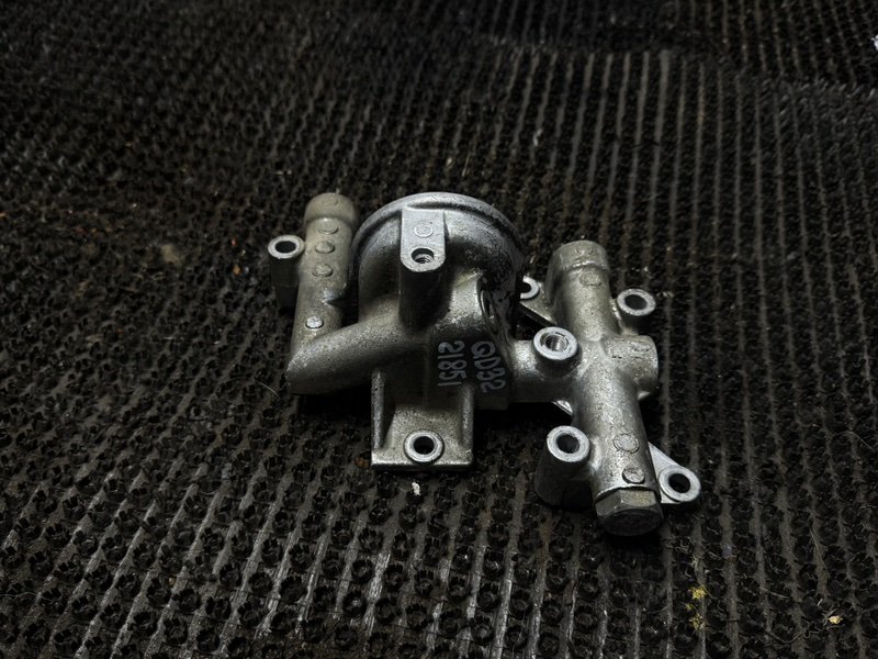 Корпус масляного фильтра Nissan Atlas R4F23 QD32 (б/у)