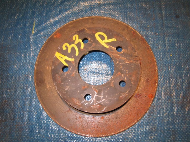 Тормозной диск Nissan Cefiro A33 VQ20DE задний (б/у)