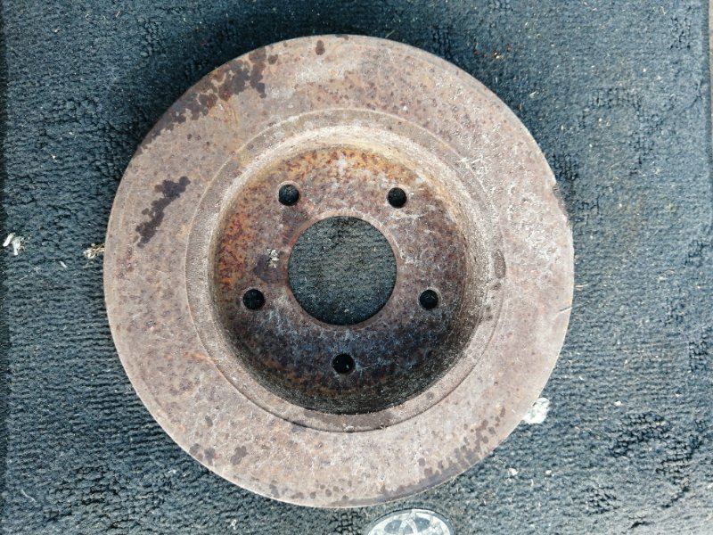 Тормозной диск Nissan Primera P12 QR20 задний (б/у)