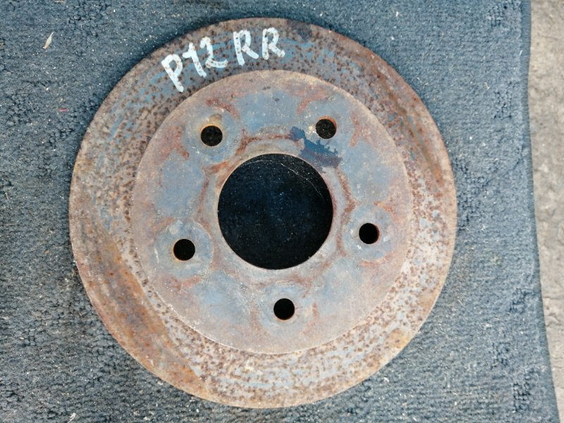 Тормозной диск Nissan Primera P12 QR20 задний (б/у)