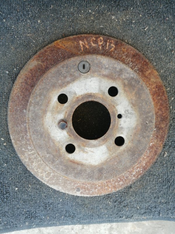 Тормозной диск Toyota Vitz NCP13 1NZ задний (б/у)