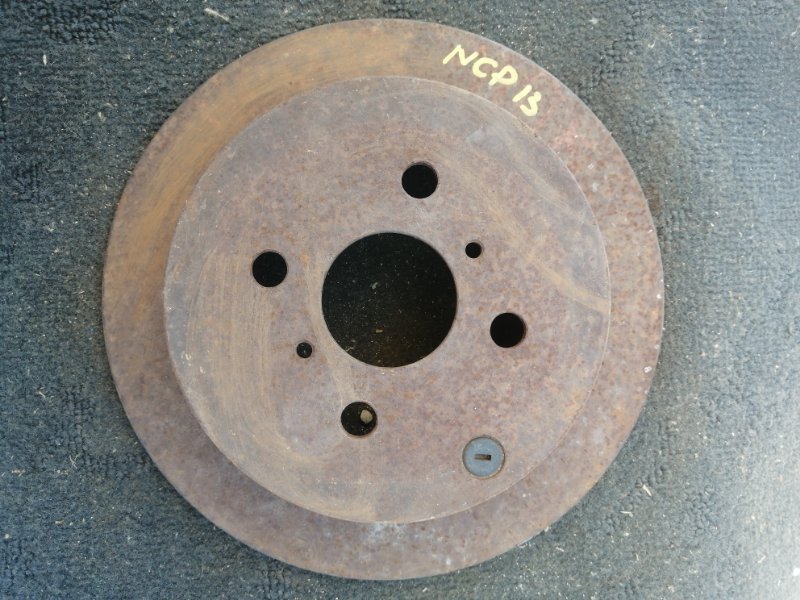Тормозной диск Toyota Vitz NCP13 1NZ задний (б/у)