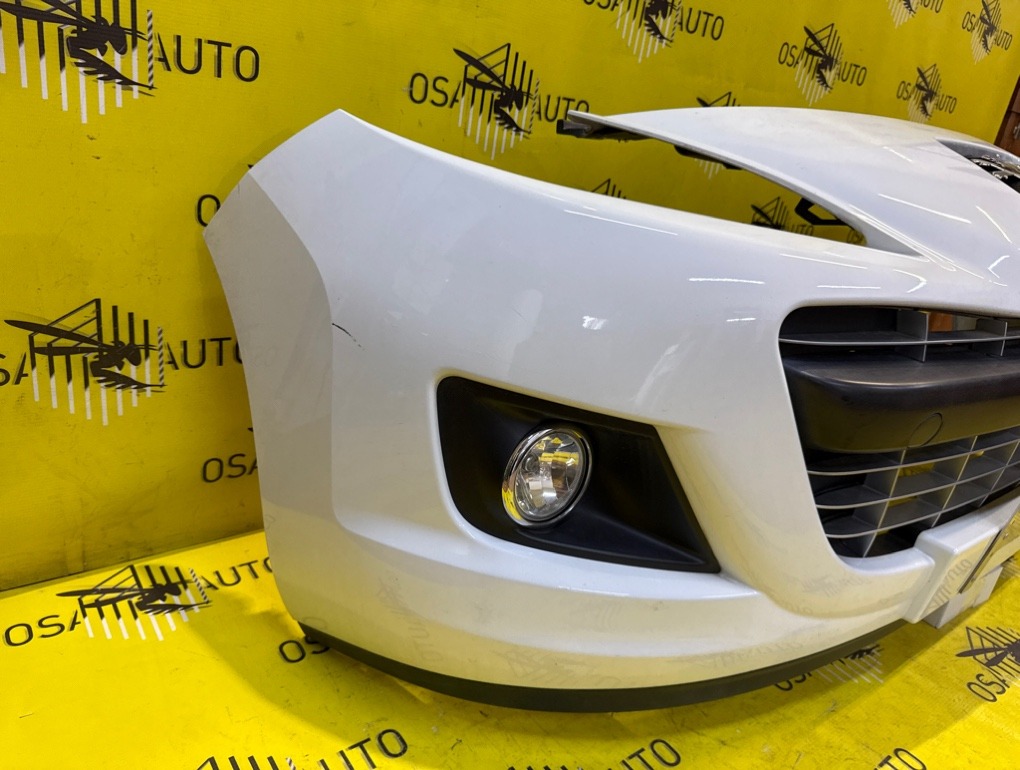 Бампер передний 207 2010