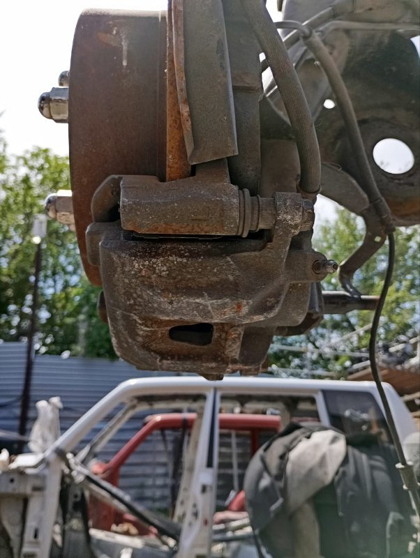 Суппорт TOYOTA ESTIMA ACR40 2AZ-FE 2002 задний левый (б/у)